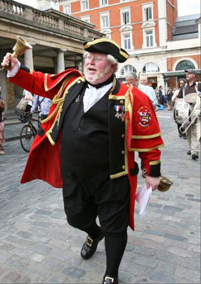 Collecting the rent in London's Covent Garden. Photo &copy; Sheila Burnett.