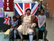 Henry VIII greet some local children