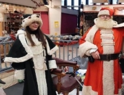 Alan Myatt dressed as Father Christmas, giving our presents to children